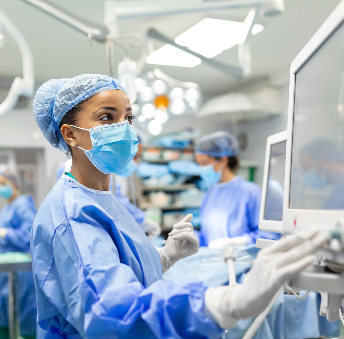 Surgeon using a computer in a surgery suite